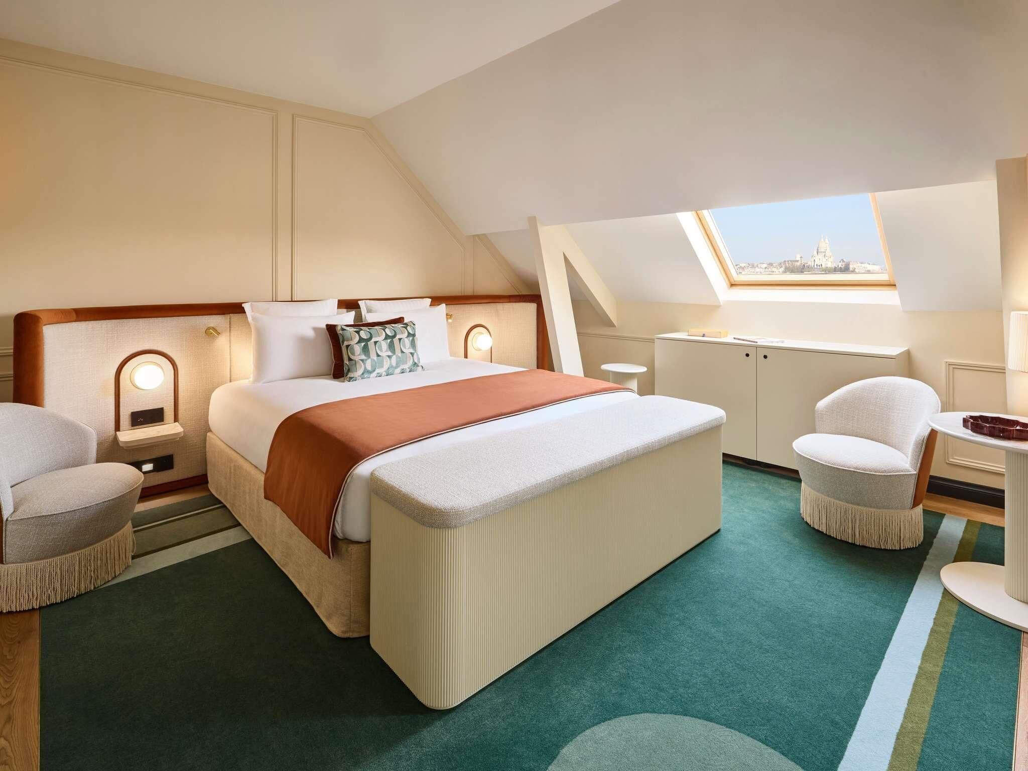 Quarto luxo, 1 cama King, vista para a cidade | Roupas de cama premium, frigobar (abastecido com itens grátis)