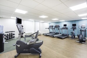 A gym with treadmills, elliptical machines, and free weights. - Holiday Inn Express Hopewell - Fort Lee by IHG (Hopewell)