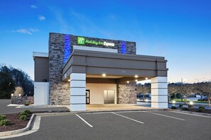 A Holiday Inn Express building with a stone facade and a clear sky. - Holiday Inn Express Hopewell - Fort Lee by IHG (Hopewell)