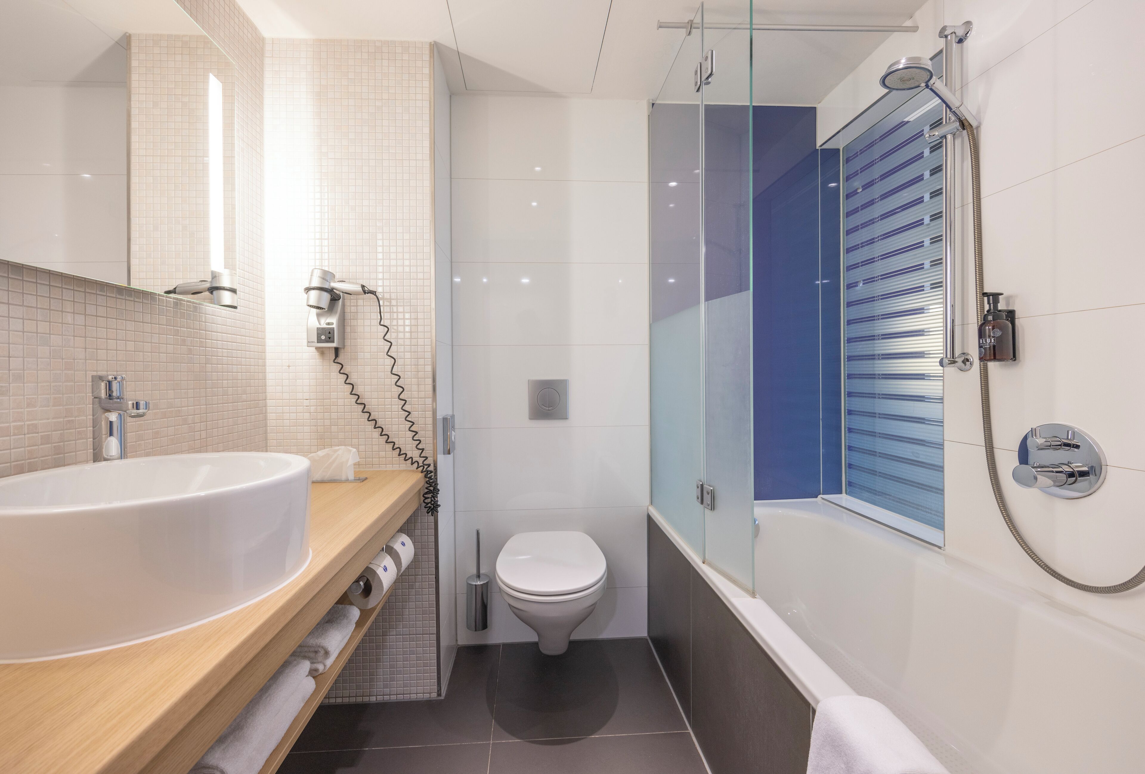 luxury room, bathtub | bathroom | rainfall showerhead, eco-friendly toiletries, hair dryer, towels