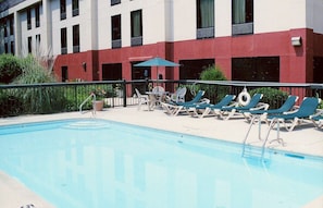 Outdoor pool, open 8 AM to midnight, pool loungers