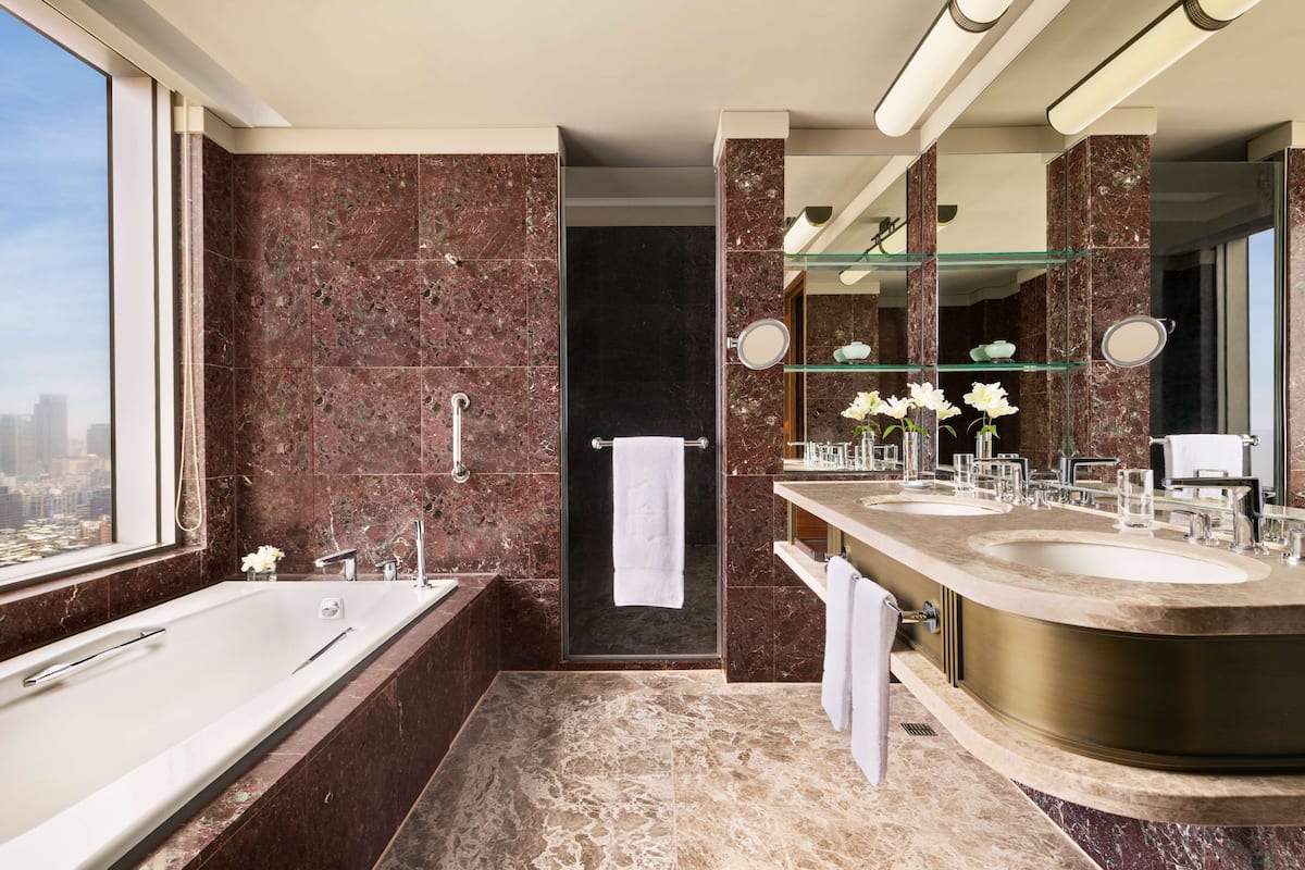 separate bathtub and shower, free toiletries, hair dryer, bathrobes