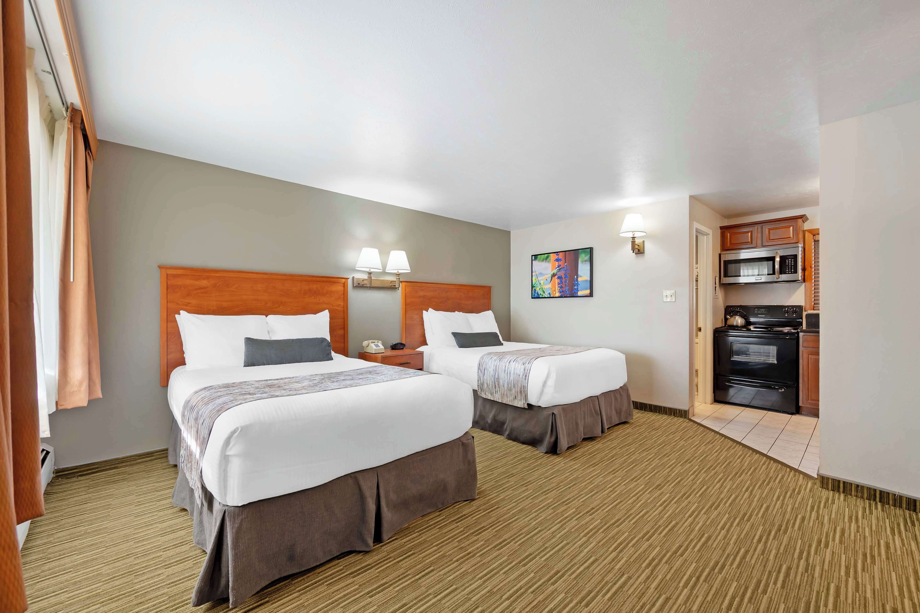 desk, blackout curtains, iron/ironing board, free cots/infant beds