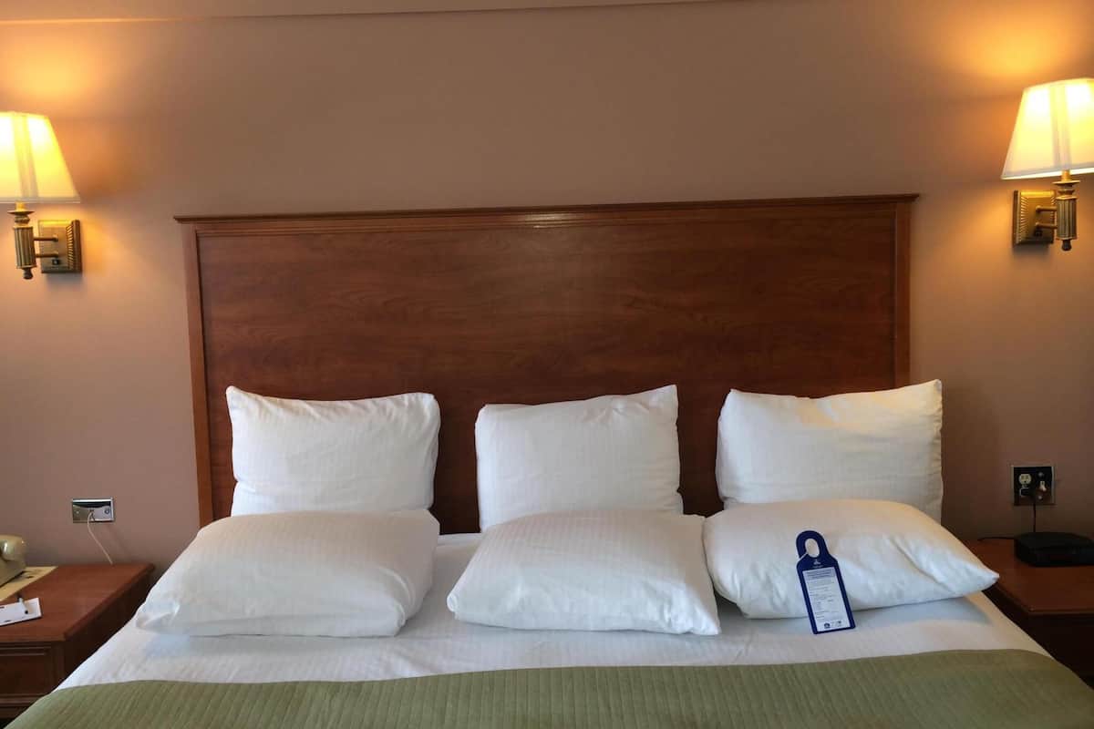 Desk, blackout drapes, iron/ironing board, free cribs/infant beds