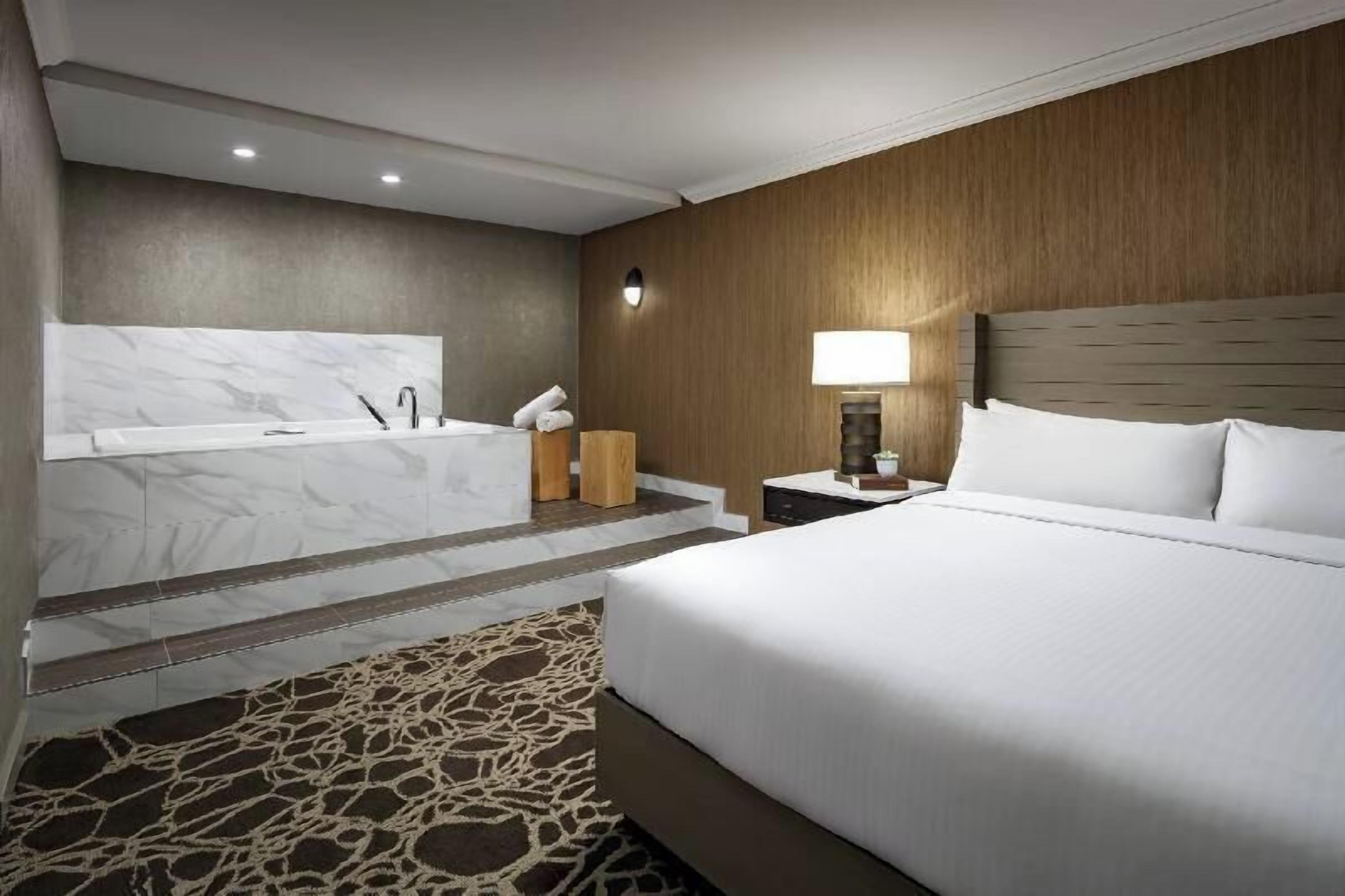 Premium bedding, pillowtop beds, minibar, in-room safe