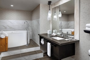 Combined shower/tub, designer toiletries, hair dryer, bathrobes