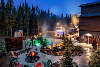 Couples treatment rooms, sauna, spa tub, steam room at Kananaskis Mountain Lodge, Autograph Collection