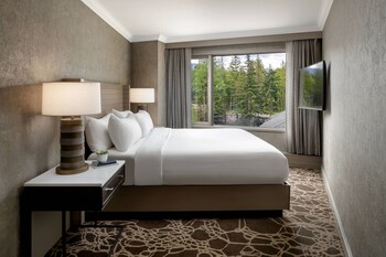 Family Room, 1 King Bed | Premium bedding, pillowtop beds, minibar, in-room safe at Kananaskis Mountain Lodge, Autograph Collection