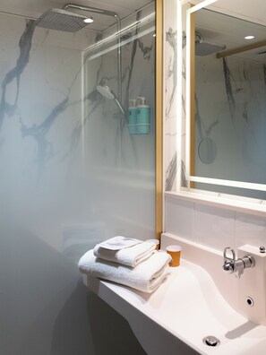 Shower, rainfall showerhead, eco-friendly toiletries, hair dryer