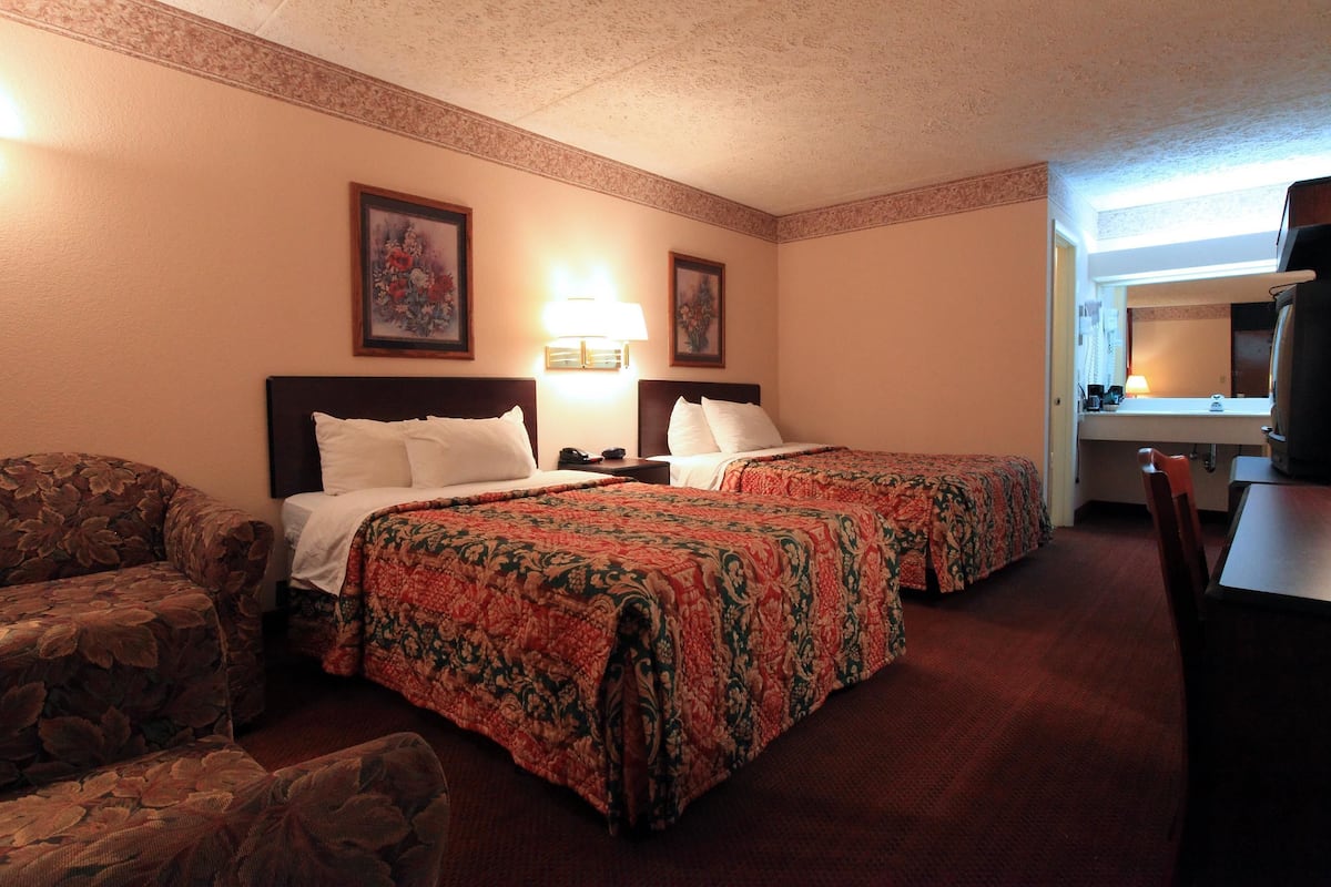 Blackout drapes, iron/ironing board, WiFi (free), alarm clocks