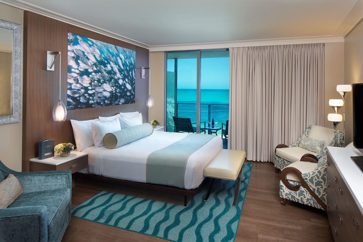 Deluxe Room, 1 King Bed, Gulf View | 1 bedroom, premium bedding, in-room safe, blackout curtains