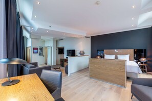 Suite, Canal View (Amsterdam) | Minibar, in-room safe, desk, laptop workspace - Radisson Blu Hotel, Amsterdam City Center (Amsterdam)