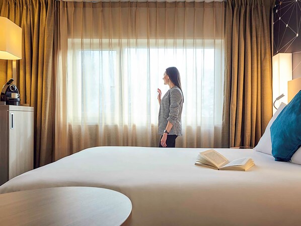 Premium bedding, in-room safe, desk, blackout drapes