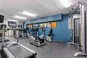 Stay fit on the go with our fully equipped gym featuring treadmills, ellipticals, and a weight machine.