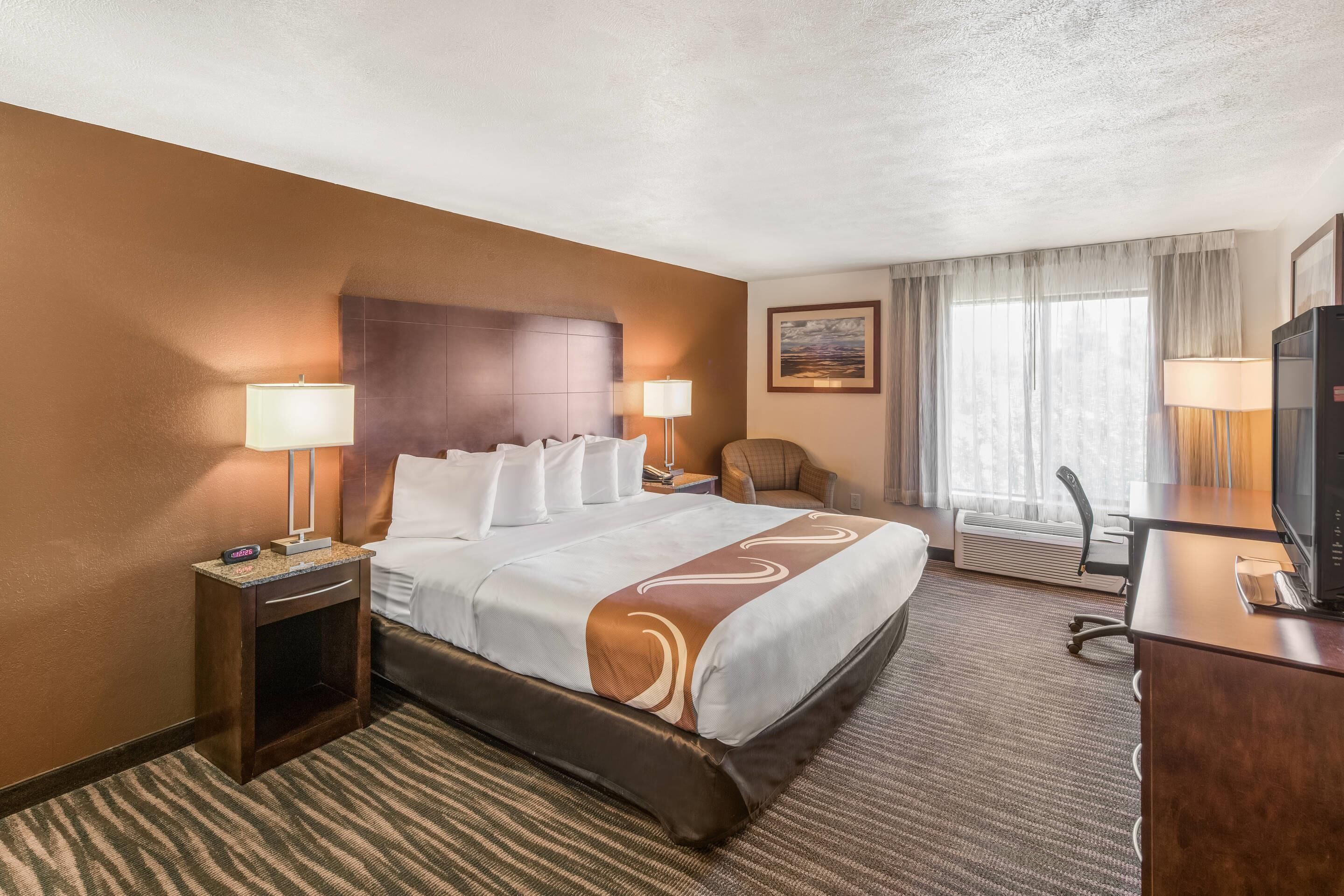 Premium bedding, desk, blackout curtains, iron/ironing board