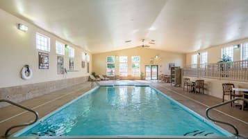 Indoor pool, open 8:00 AM to 10:00 PM, pool loungers