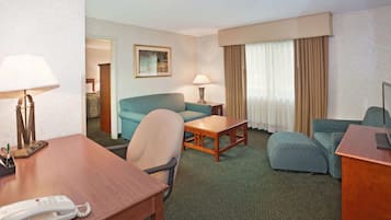 Hypo-allergenic bedding, desk, laptop workspace, blackout drapes