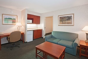 Hypo-allergenic bedding, desk, laptop workspace, blackout curtains