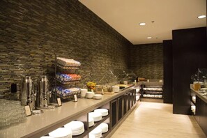 Daily buffet breakfast (USD 18 per person)