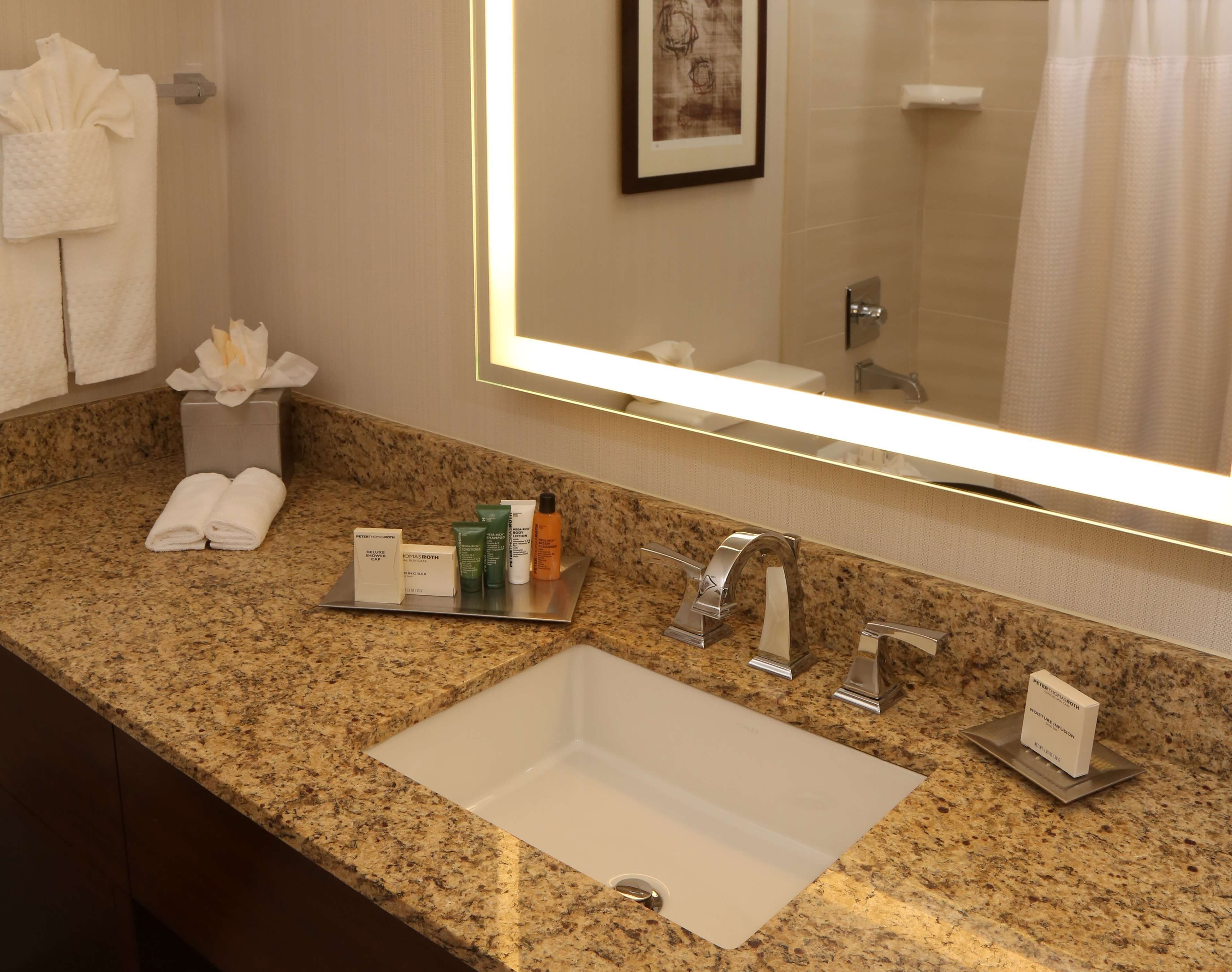 combined shower/bathtub, free toiletries, hair dryer, towels