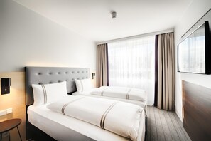 Twin kamer, rolstoeltoegankelijke douche | 1 slaapkamer, een kluis op de kamer, geluiddichte muren, gratis wifi