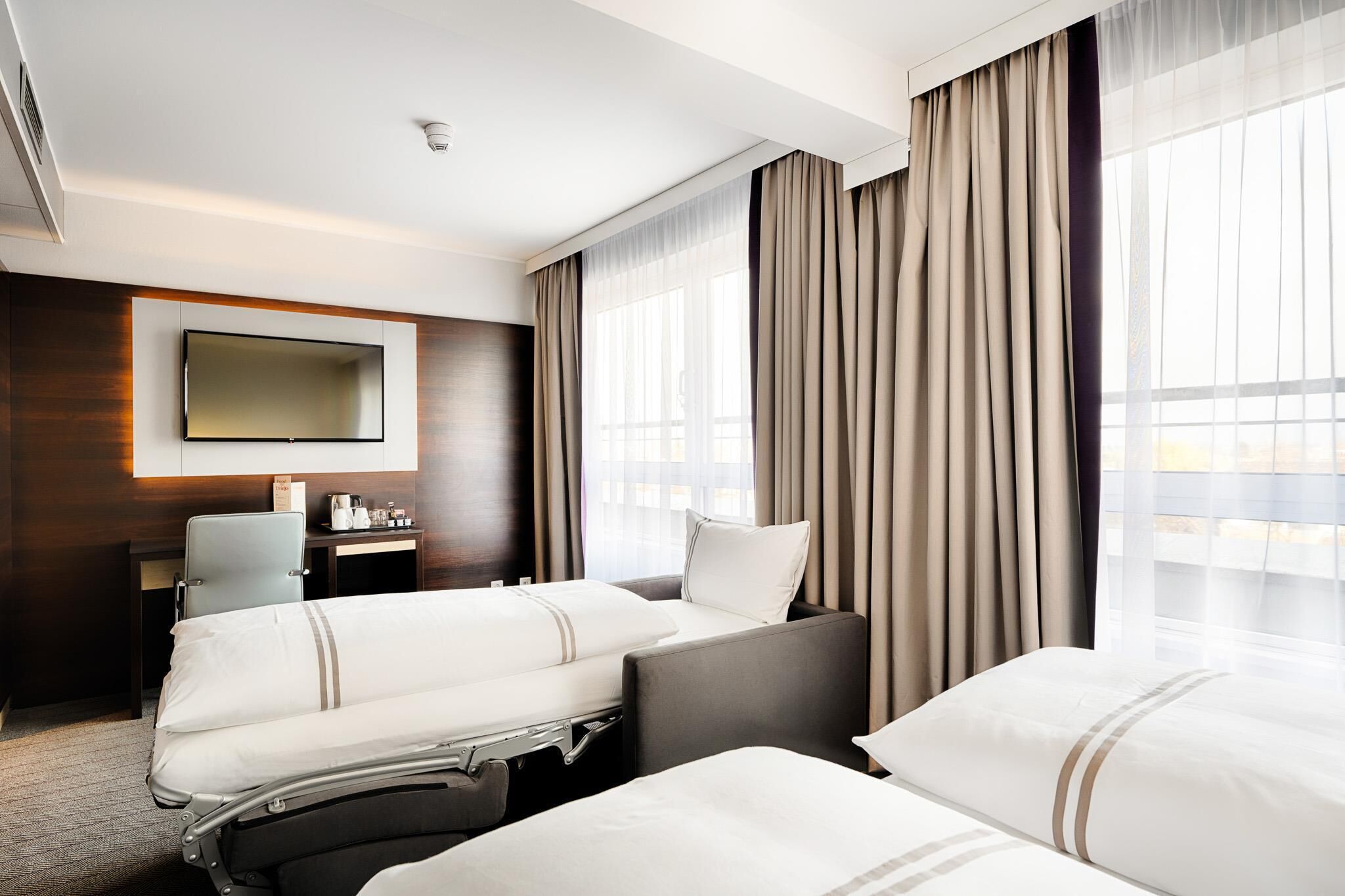 Kolmen hengen perhehuone | Tallelokero huoneessa, äänieristys, ilmainen Wi-Fi