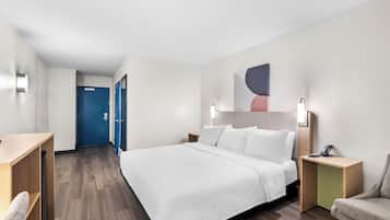 Room, 1 King Bed, Accessible (Mobility & Hearing, Roll-in Shower) | Desk, laptop workspace, blackout curtains, iron/ironing board