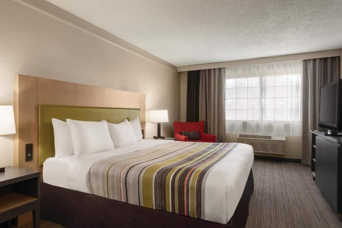 Premium bedding, pillow-top beds, desk, blackout curtains