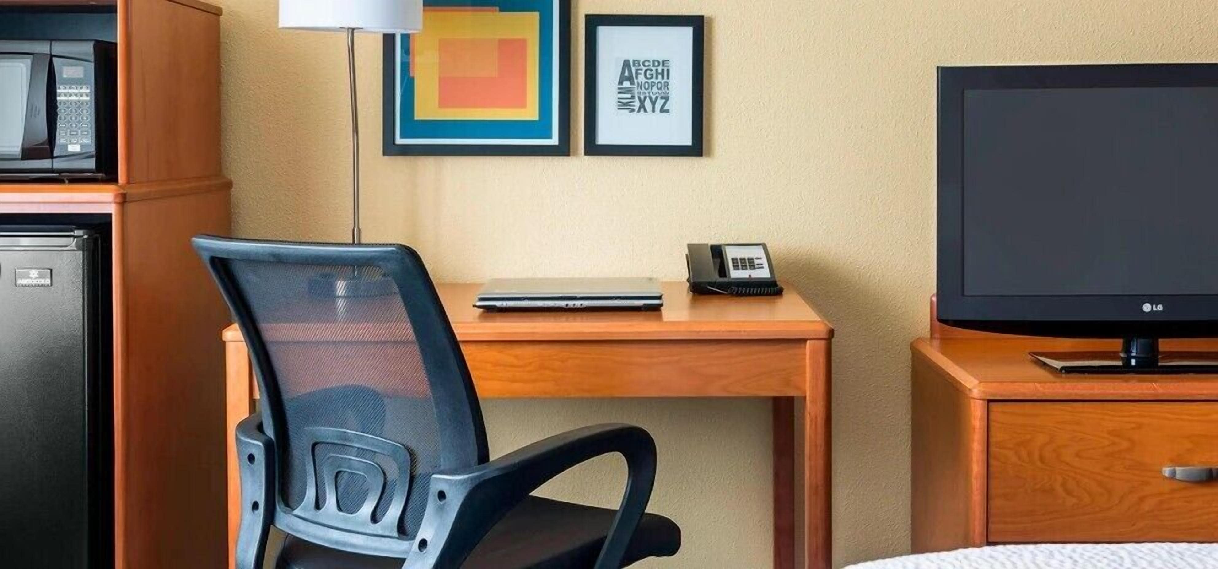 in-room safe, desk, blackout curtains, iron/ironing board