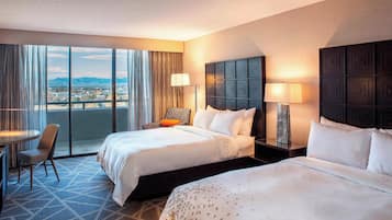 Premium bedding, down comforters, in-room safe, desk