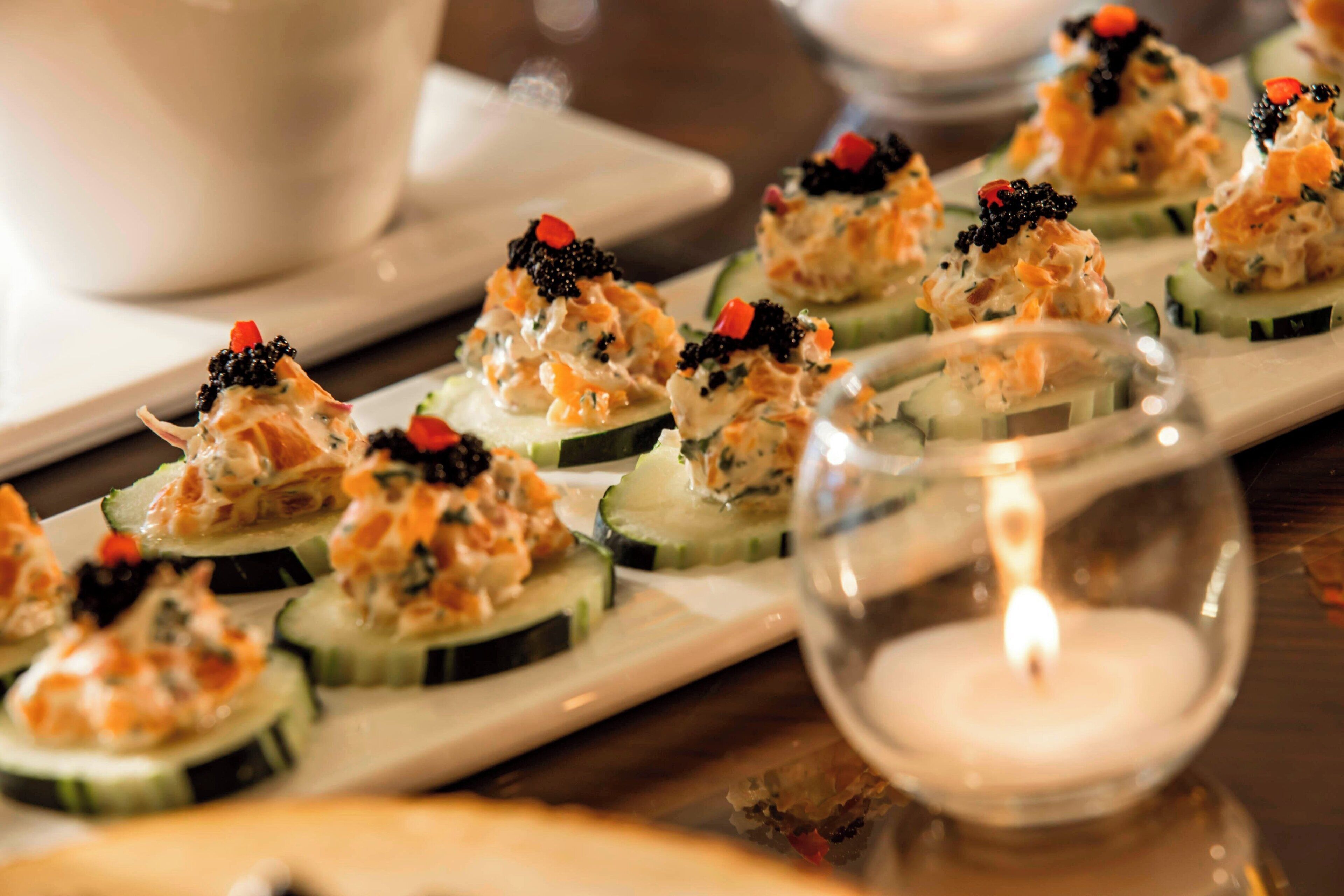 A tray of appetizers on a table.