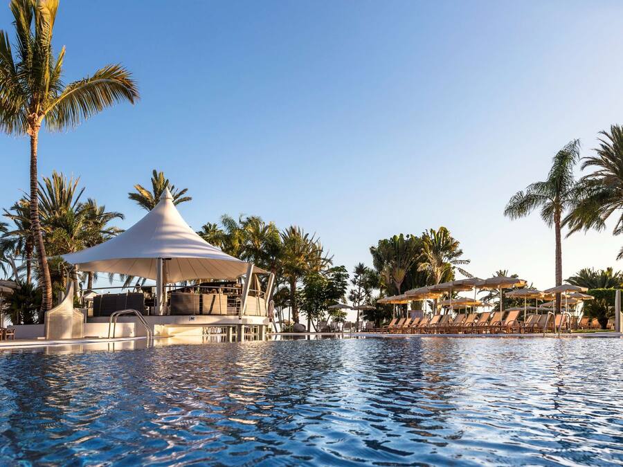 2 outdoor pools, pool umbrellas, pool loungers