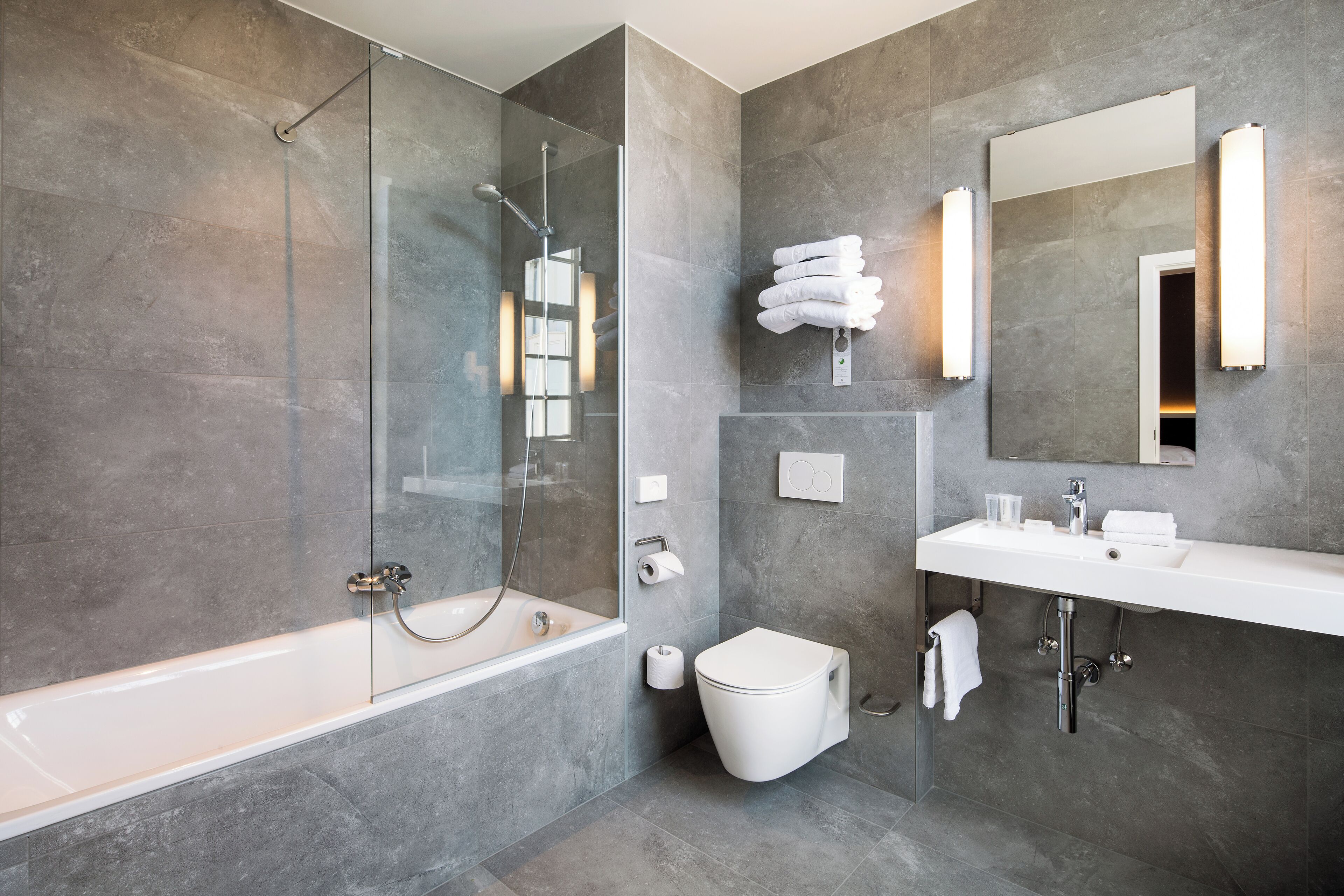 rainfall showerhead, designer toiletries, hair dryer, towels