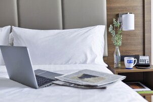 Ropa de cama de alta calidad y colchones con acolchado adicional