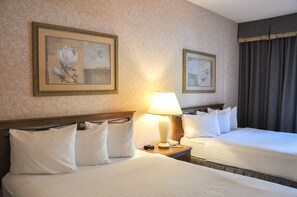 Down comforters, desk, blackout drapes, iron/ironing board