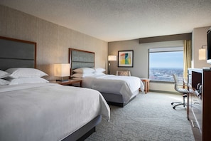 Hypo-allergenic bedding, down comforters, pillowtop beds, in-room safe