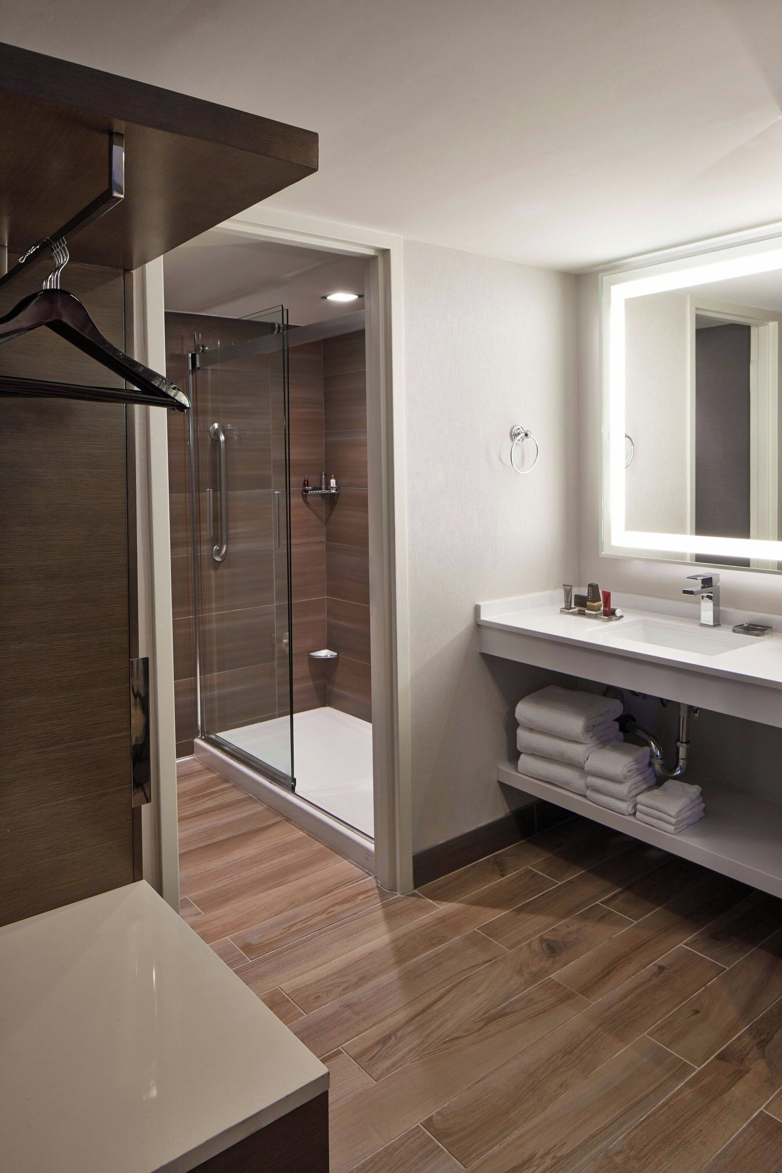 shower, free toiletries, hair dryer, towels