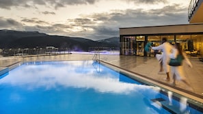 Indoor pool, outdoor pool, open 7 AM to 10 PM, pool umbrellas