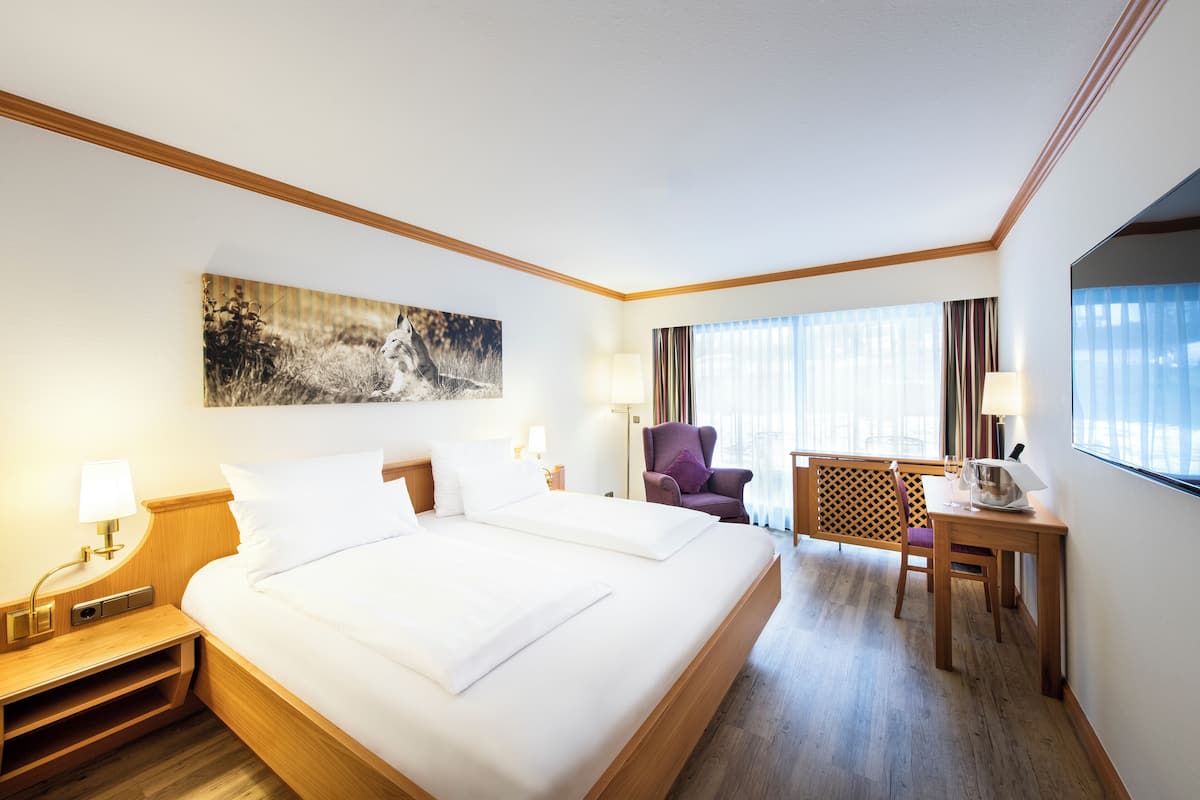 Comfort Double Room (South) | Minibar, in-room safe, desk, laptop workspace