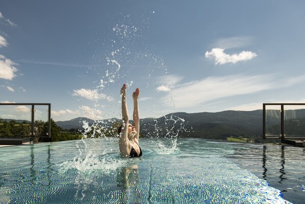 Indoor pool, outdoor pool, open 7 AM to 10 PM, pool umbrellas