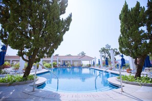 Indoor pool, outdoor pool, pool umbrellas