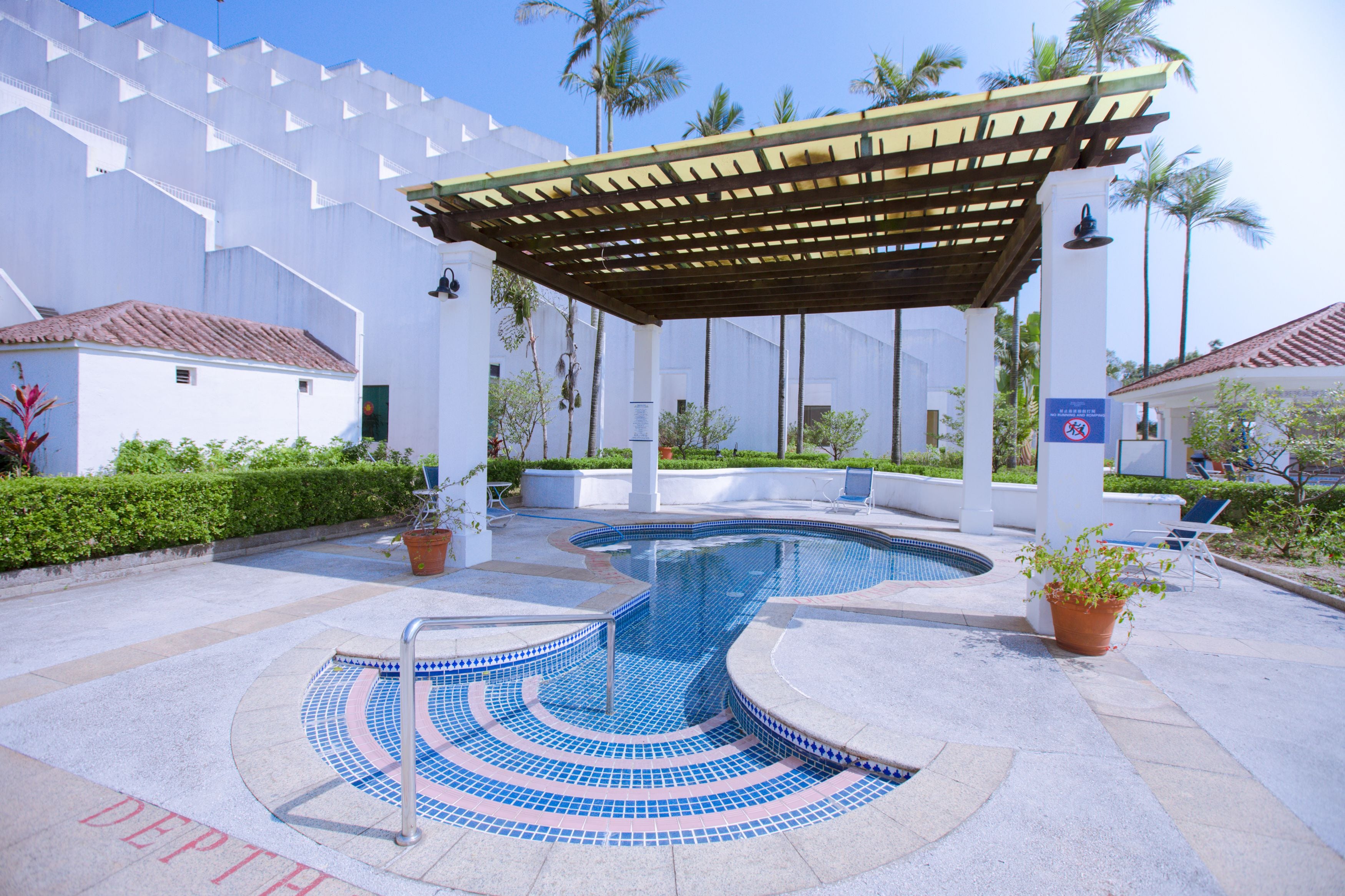 indoor pool, outdoor pool, pool umbrellas