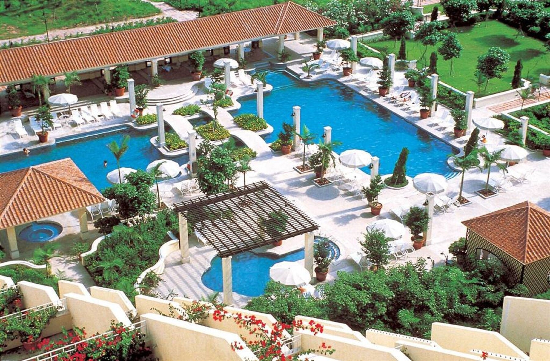 Indoor pool, outdoor pool, pool umbrellas