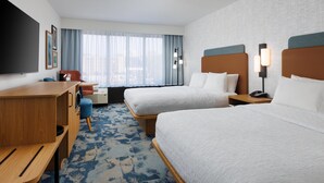 A hotel room with two beds, a desk, a chair, a TV, and a window with curtains. - Hampton Inn Oak Ridge Knoxville (Oak Ridge)