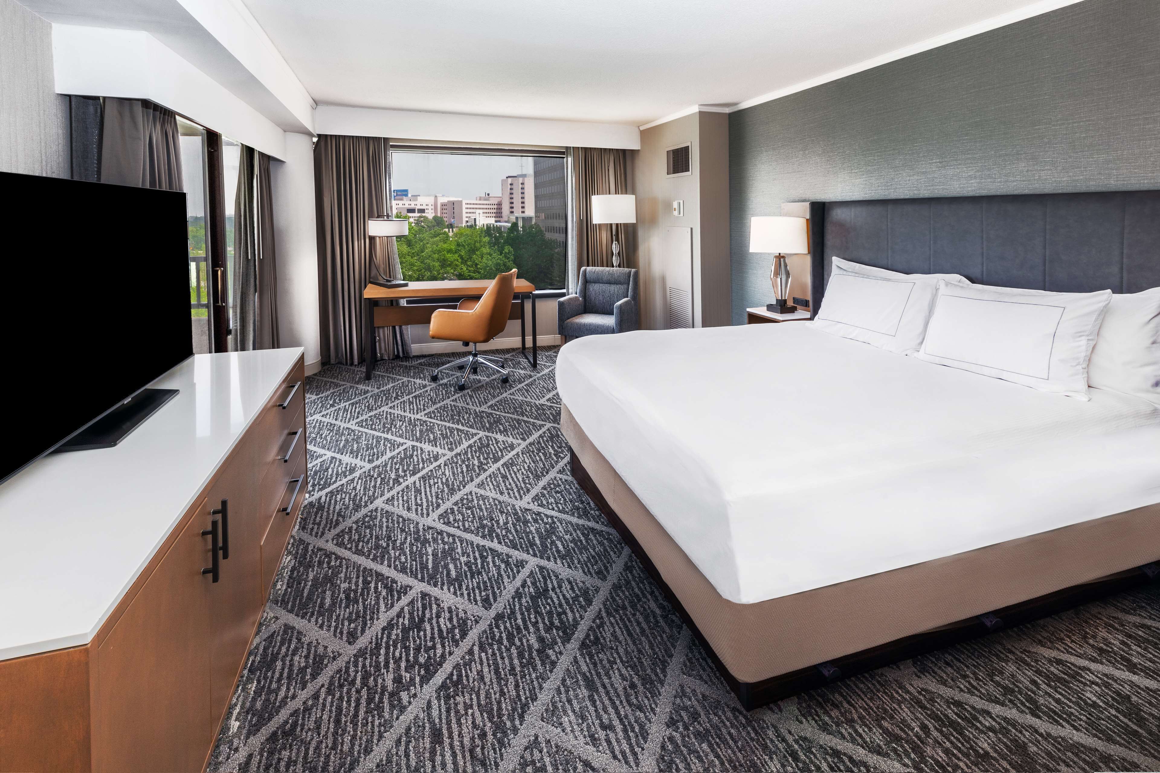 One King Bed with Balcony Corner | In-room safe, desk, laptop workspace, blackout drapes