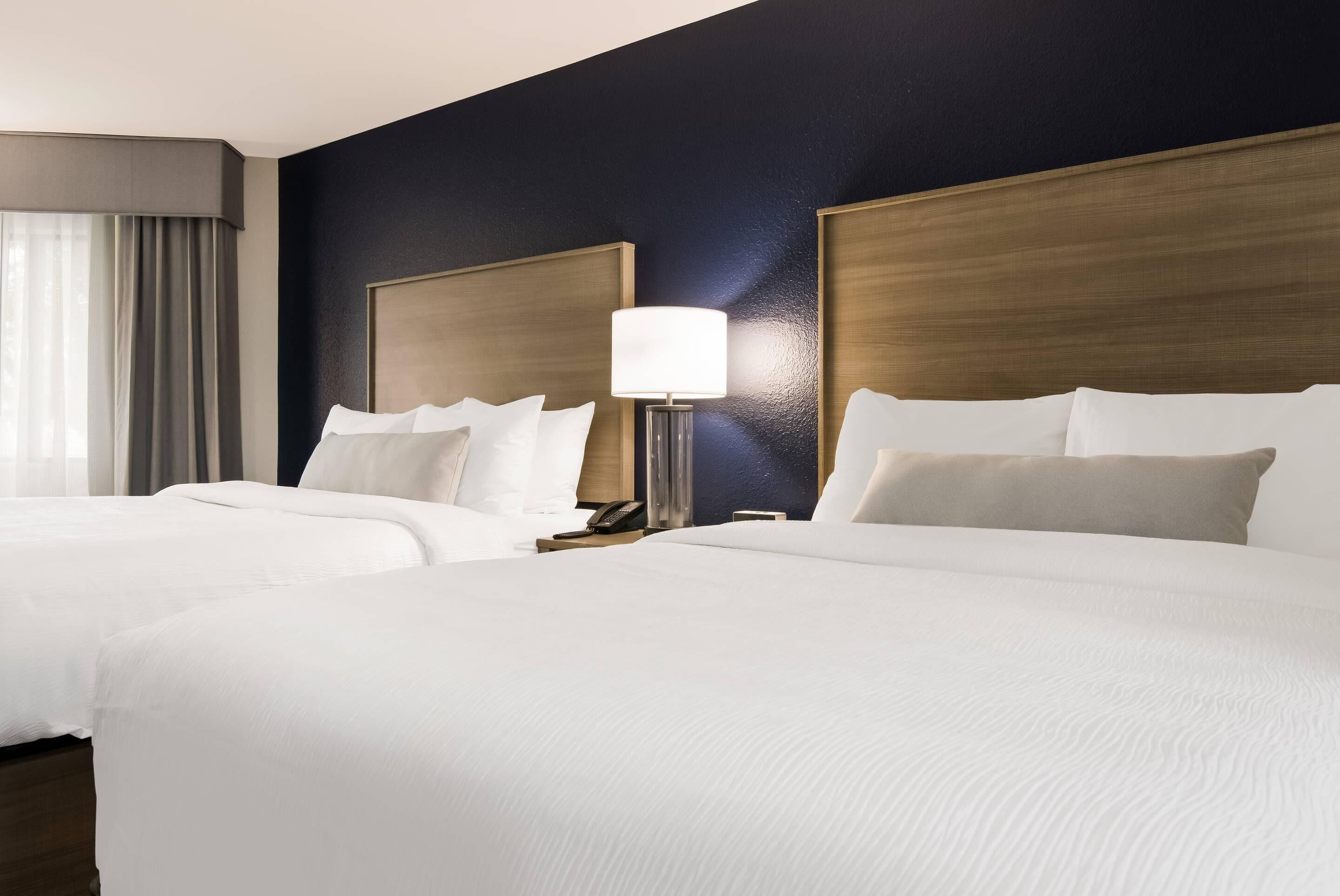 Standard Room, 2 Queen Beds, Non-Smoking | Desk, laptop workspace, blackout drapes, iron/ironing board