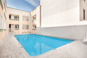 Seasonal outdoor pool, open 10:00 AM to 8:00 PM, sun loungers