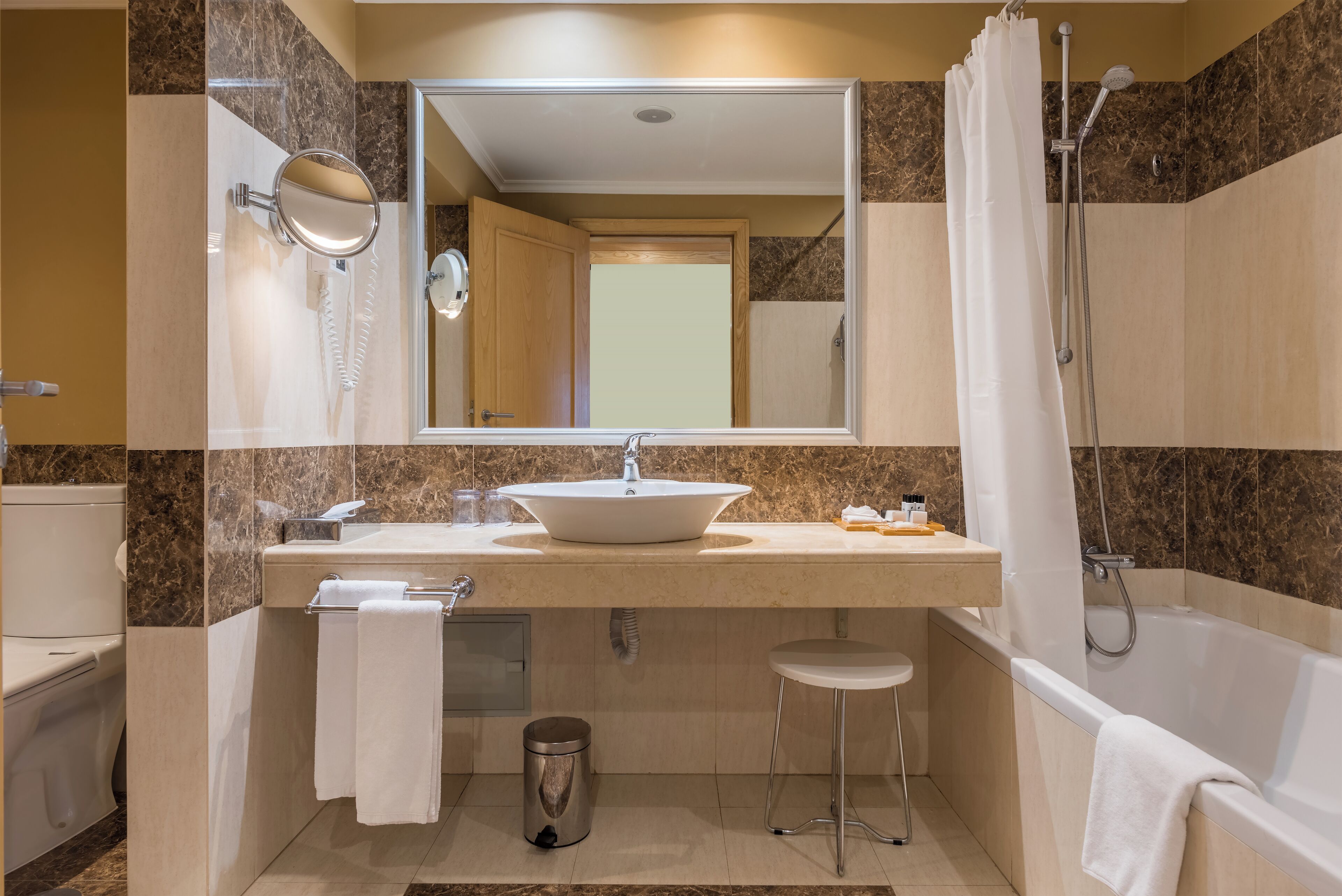 combined shower/bathtub, free toiletries, hair dryer, bathrobes