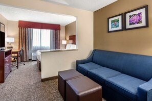 Suite, 1 Queen Bed, Non Smoking | Desk, laptop workspace, blackout drapes, iron/ironing board