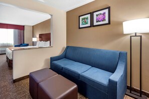 Suite, 1 Queen Bed, Non Smoking | Desk, laptop workspace, blackout drapes, iron/ironing board